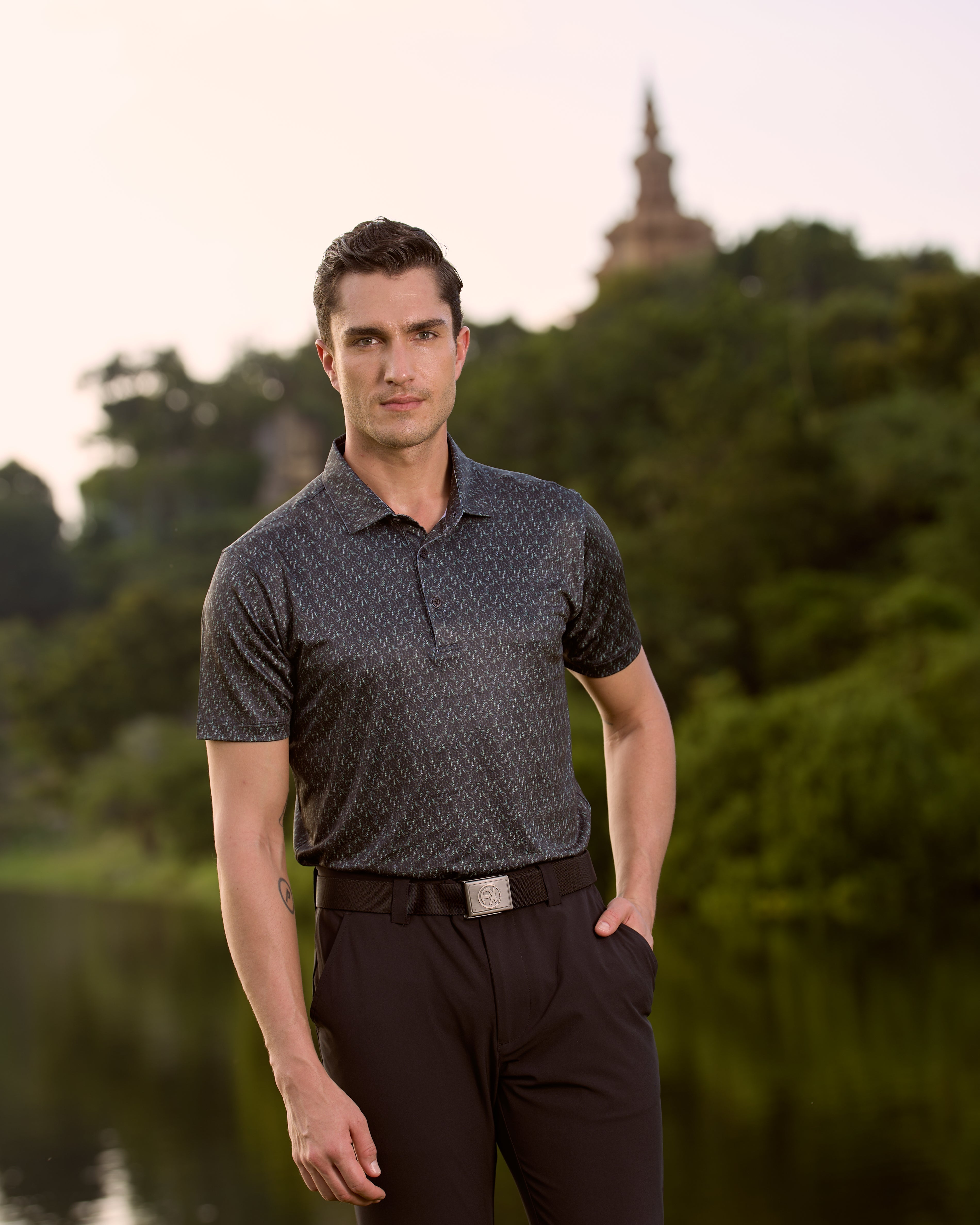 Fenix XCell performance golf polo featuring moisture-wicking fabric and tailored athletic fit. Martini glass print.
