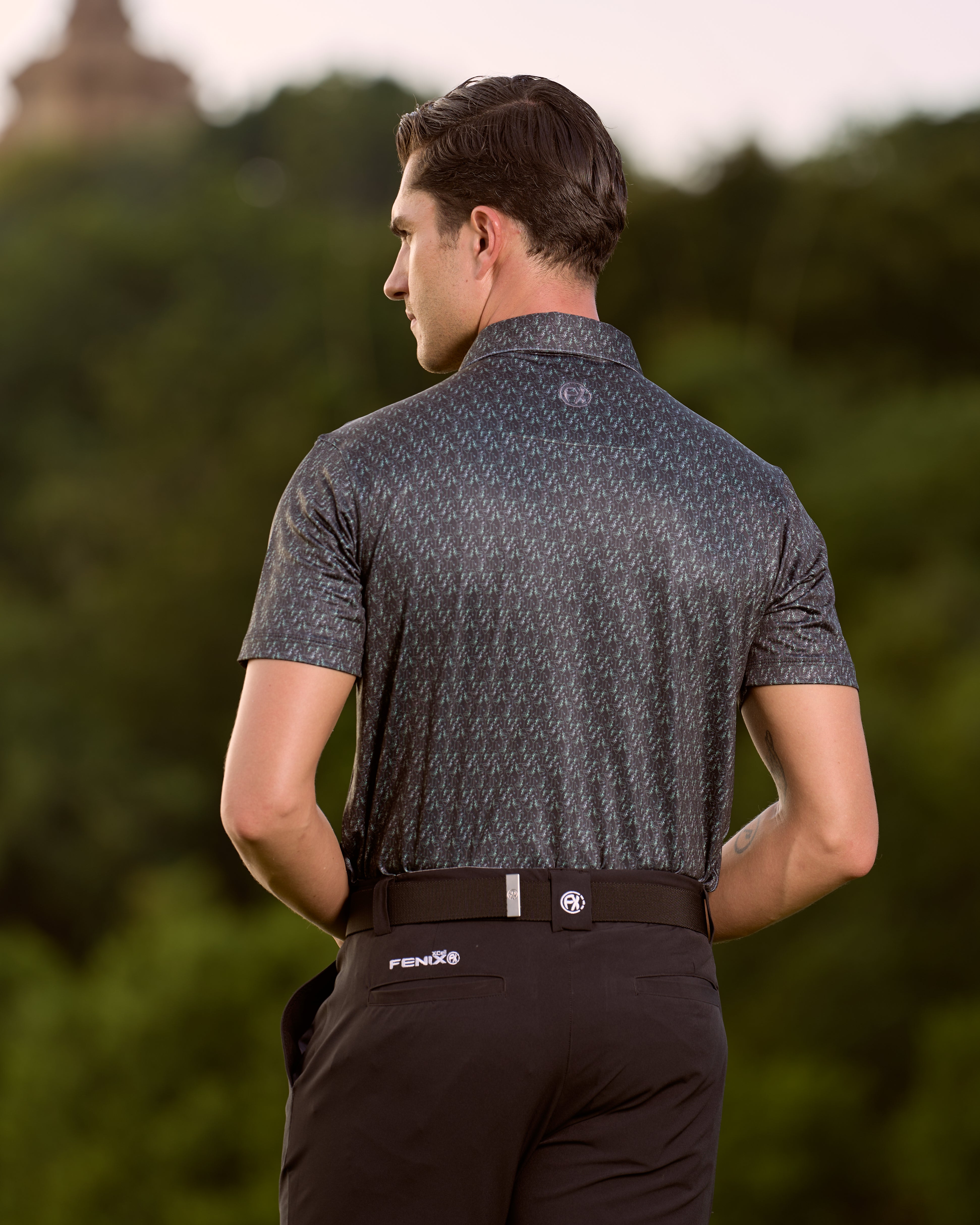 Fenix XCell performance golf polo featuring moisture-wicking fabric and tailored athletic fit. Martini glass print.