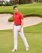 Fenix XCell red performance golf polo featuring moisture-wicking fabric and tailored athletic fit.
