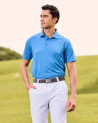 Fenix XCell french blue performance golf polo featuring moisture-wicking fabric and tailored athletic fit.