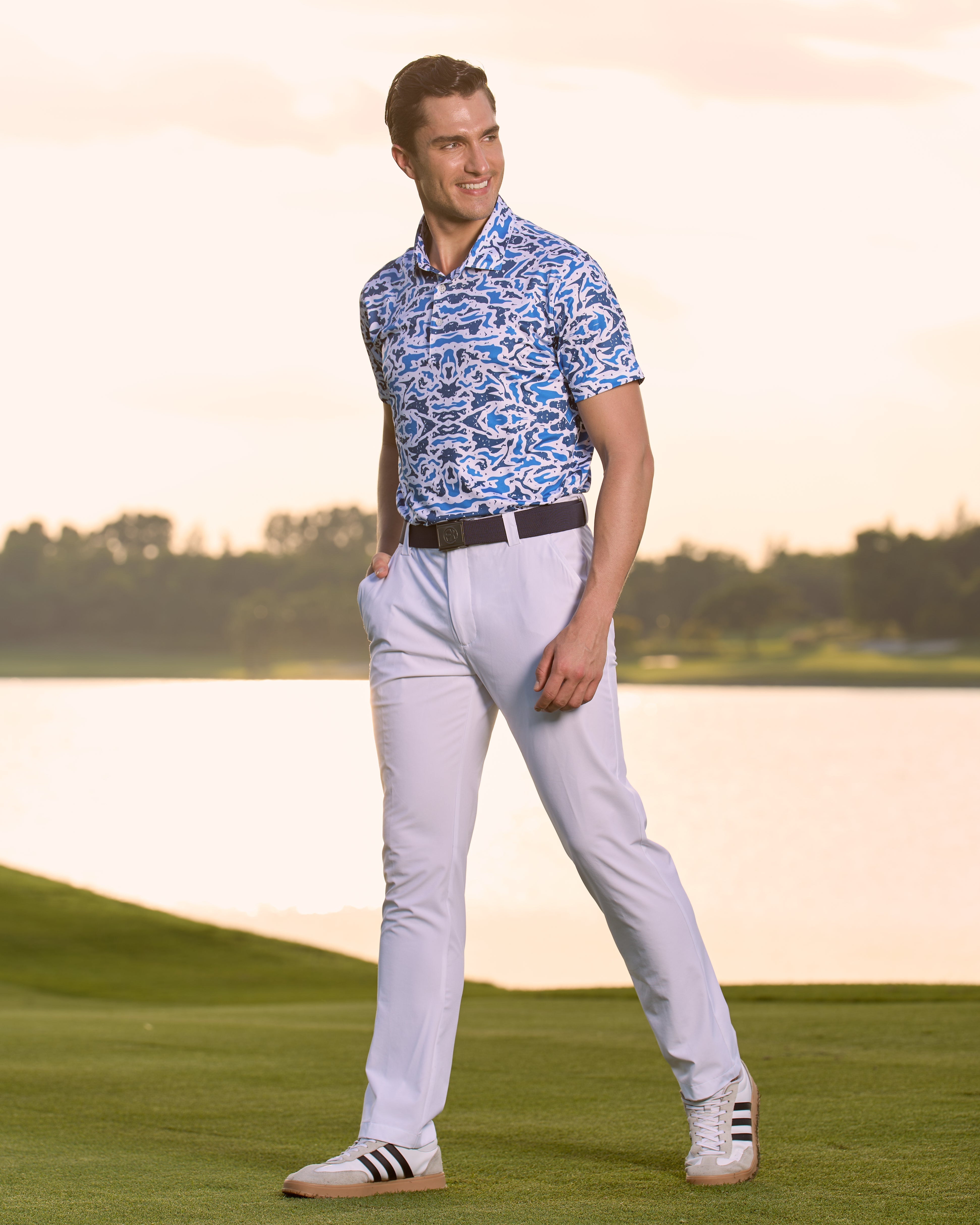 Fenix XCell french blue camo print performance golf polo featuring moisture-wicking fabric and tailored athletic fit.