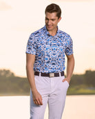 Fenix XCell french blue camo print performance golf polo featuring moisture-wicking fabric and tailored athletic fit.