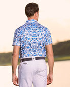 Fenix XCell french blue camo print performance golf polo featuring moisture-wicking fabric and tailored athletic fit.