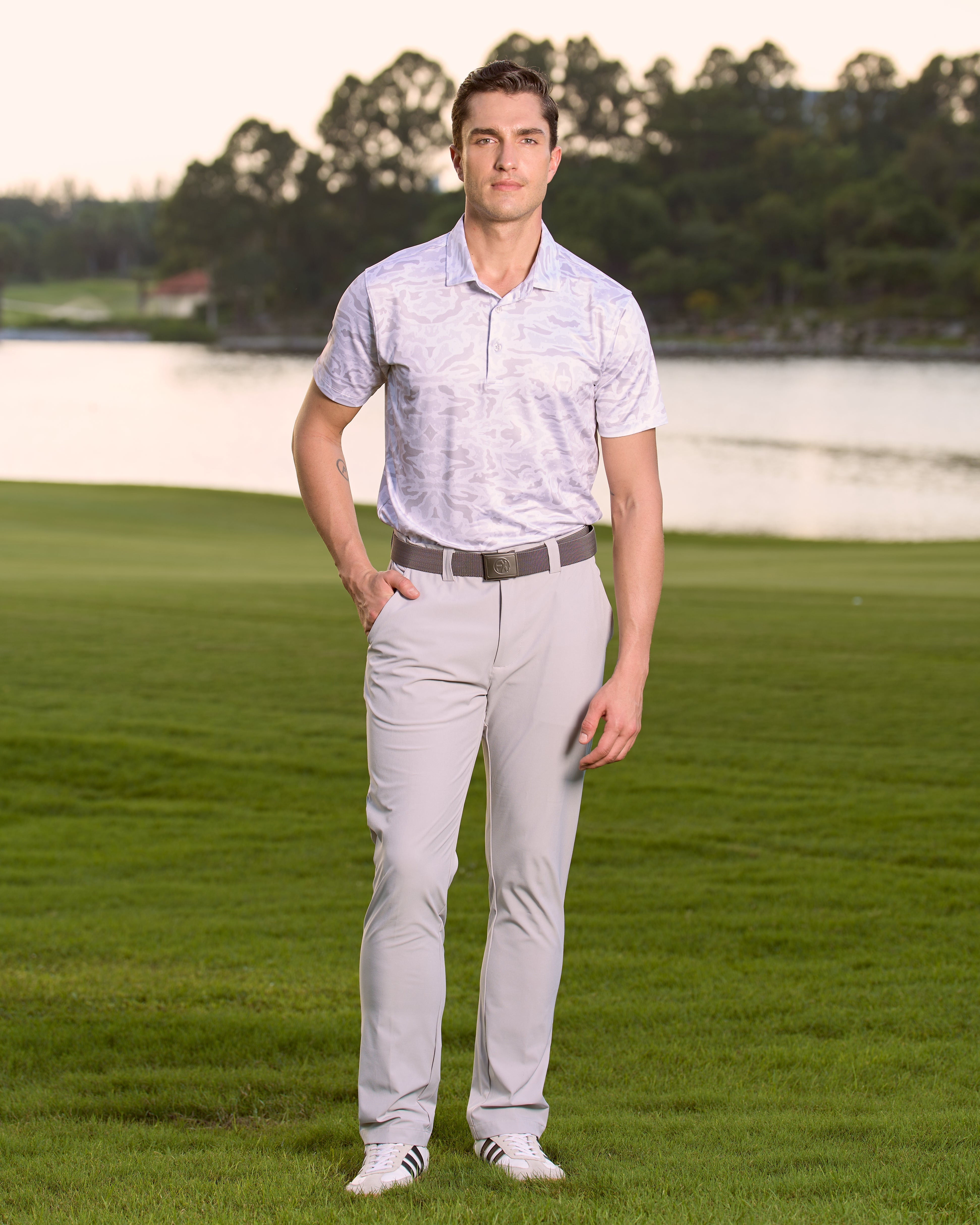 Fenix XCell pearl grey camo print performance golf polo featuring moisture-wicking fabric and tailored athletic fit.