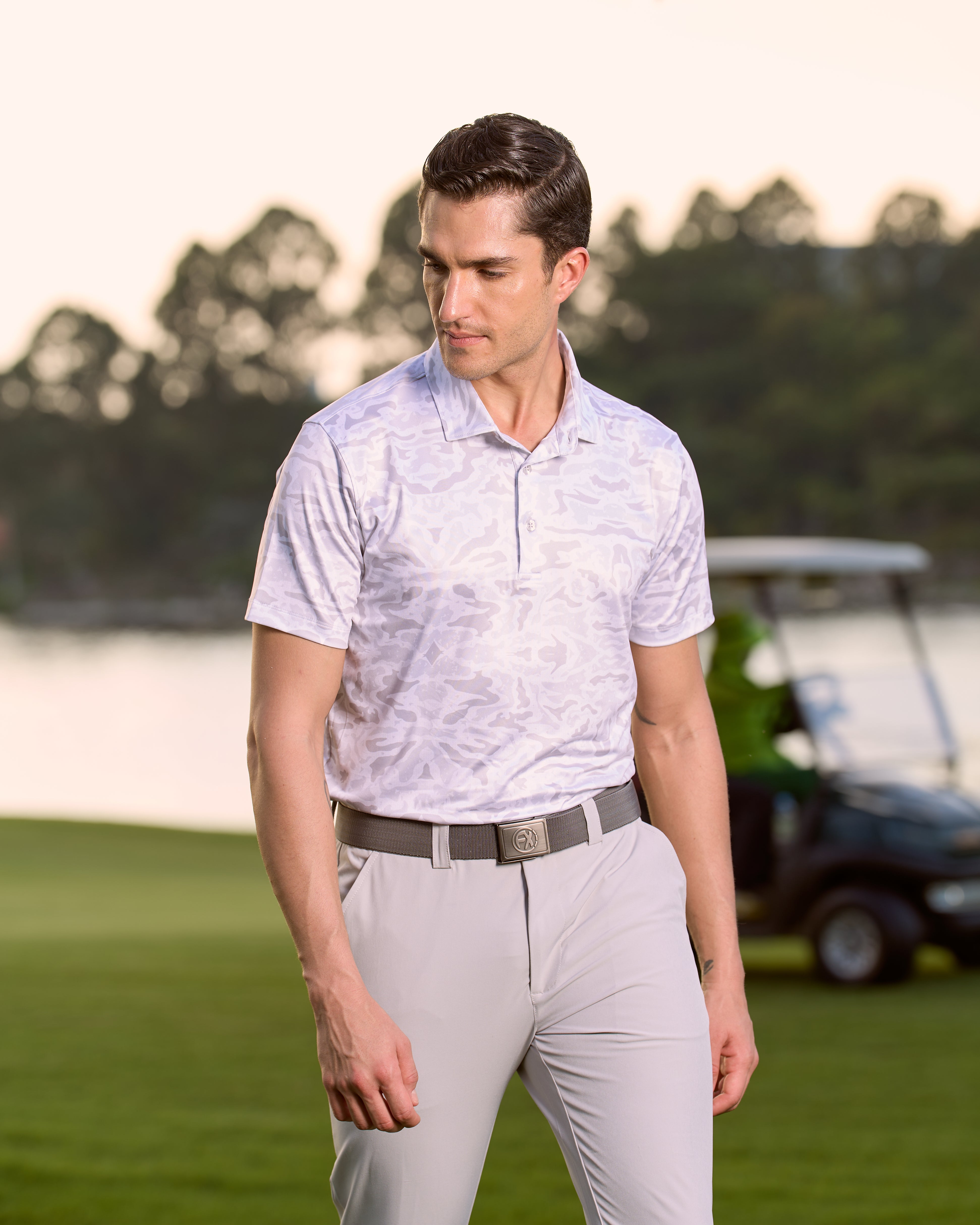Fenix XCell french pearl grey camo print performance golf polo featuring moisture-wicking fabric and tailored athletic fit.