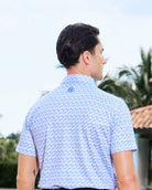 Fenix XCell performance golf polo featuring moisture-wicking fabric and tailored athletic fit. Martini glass print.