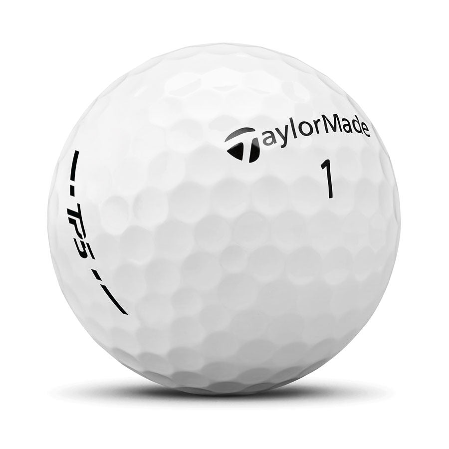 White golf ball with TaylorMade logo on a white background